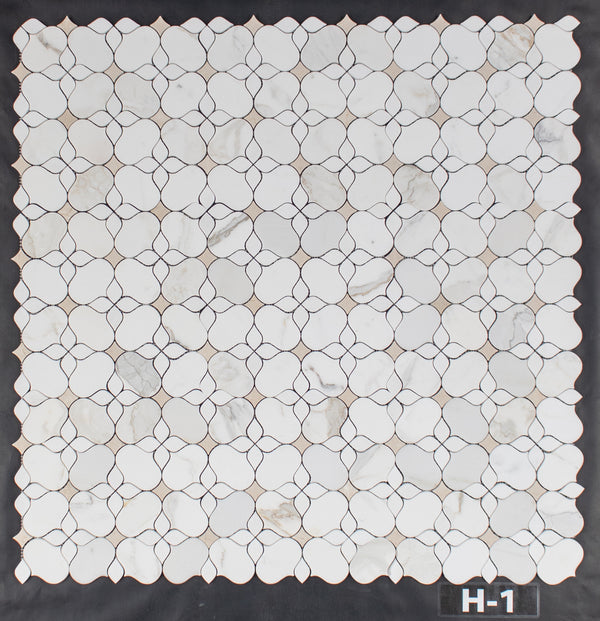 Calacatta Gold Silhouette with White Thassos and Crema Marfil Mosaic Honed