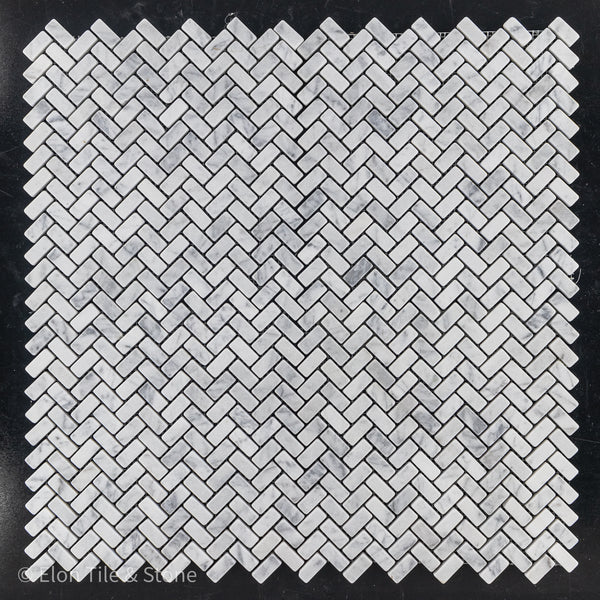 **LIMITED STOCK** Bianco Carrara 5/8" x 1 1/4" Herringbone Mosaic Tumbled