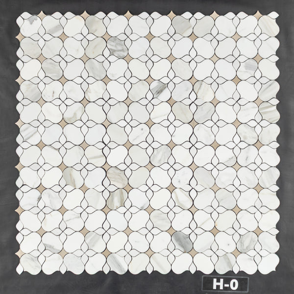 Calacatta Gold Silhouette with White Thassos and Crema Marfil Mosaic Honed