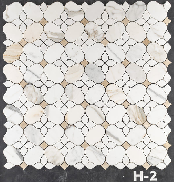 Calacatta Gold Silhouette with White Thassos and Crema Marfil Mosaic Honed