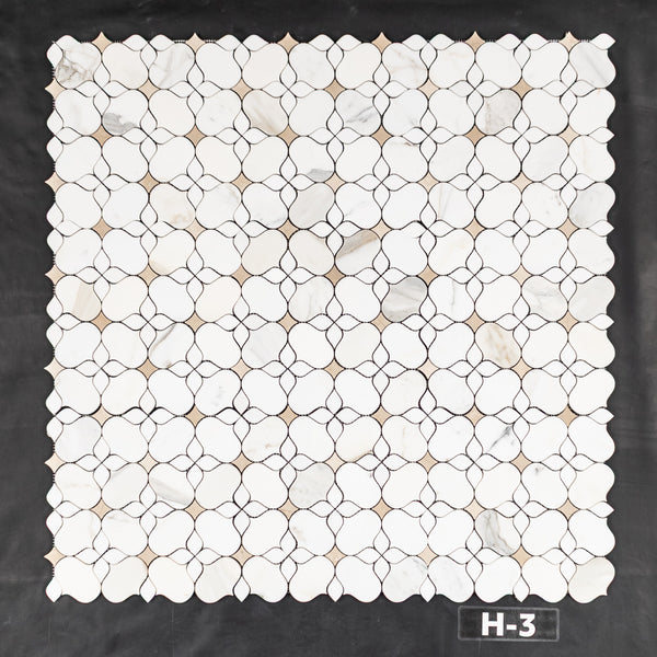 Calacatta Gold Silhouette with White Thassos and Crema Marfil Mosaic Honed