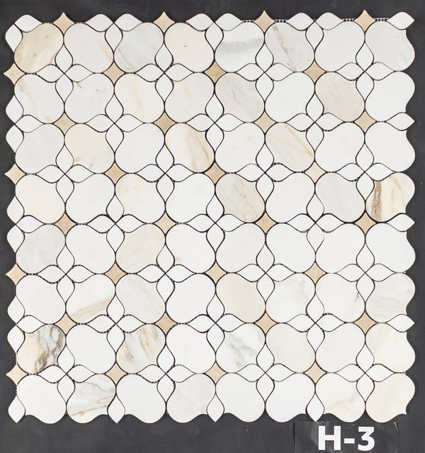 Calacatta Gold Silhouette with White Thassos and Crema Marfil Mosaic Honed