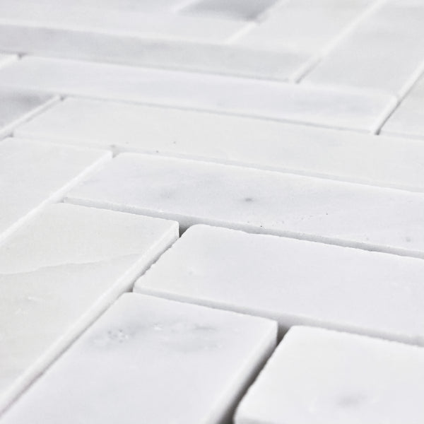 Pearl White 1" x 4" Herringbone Mosaic Honed