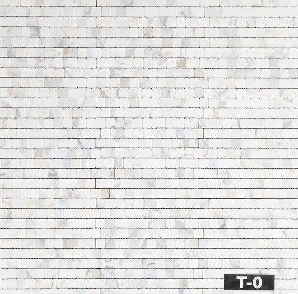xxDISCOTINUEDxx Calacatta Gold 1 1/4" Mosaico de junta rota aleatoria caído